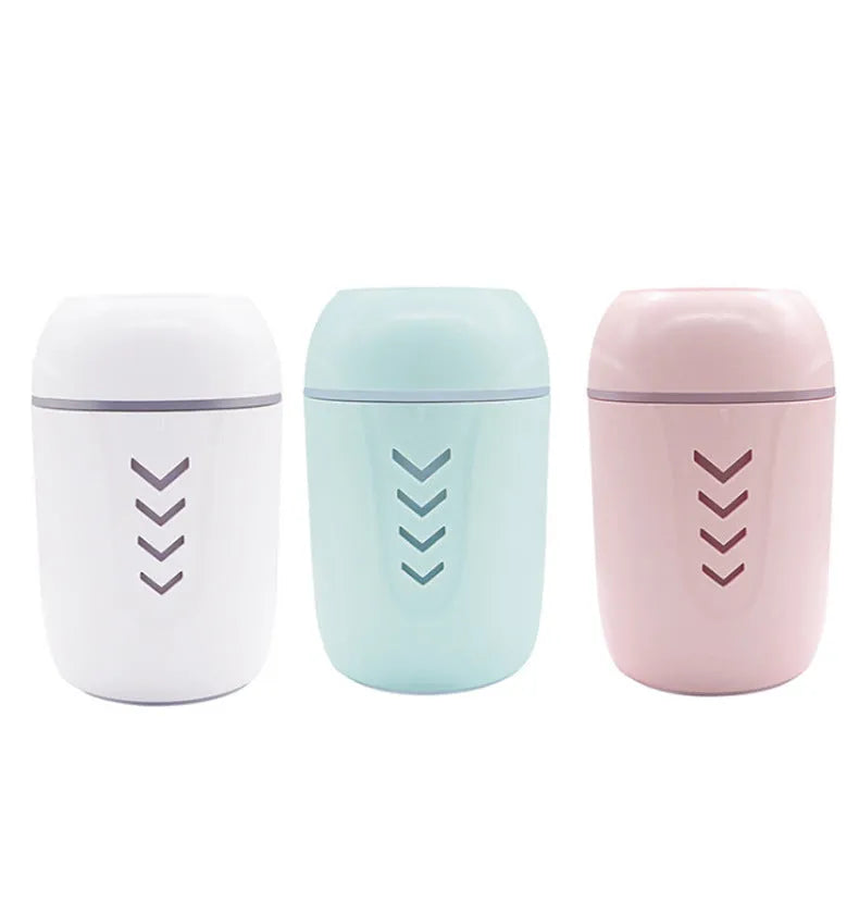 Portable car humidifier with columnar design in blue, pink, or white colour options