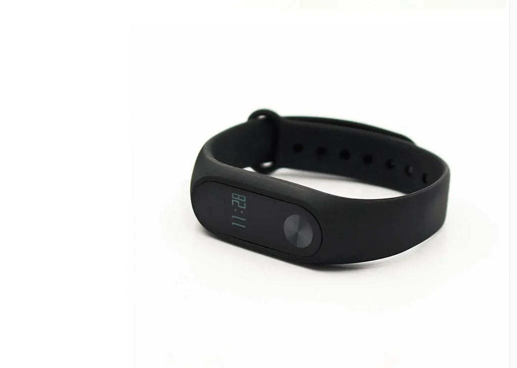 Black Xiaomi Mi Band 2 smart fitness bracelet with OLED display on adjustable wrist strap