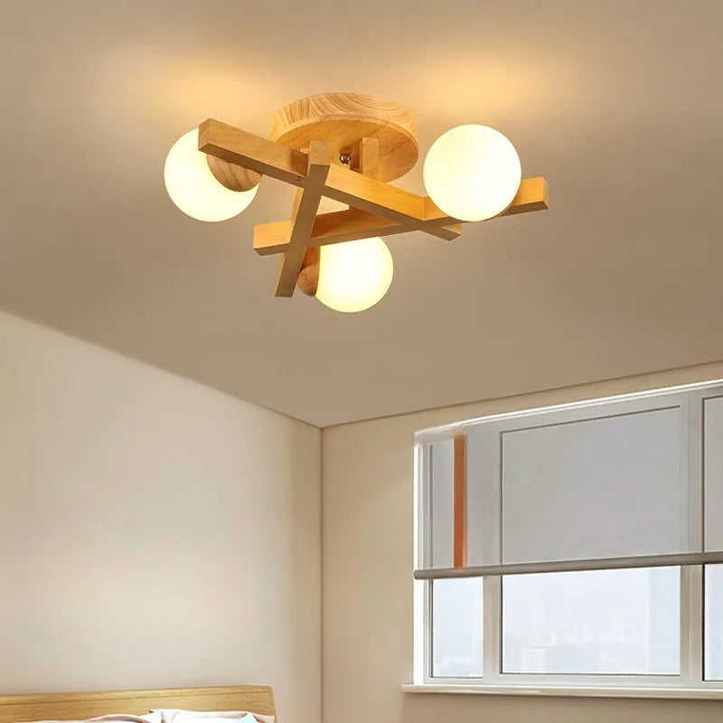 Modern wooden-style Nordic ceiling light fixture with three adjustable heads.
