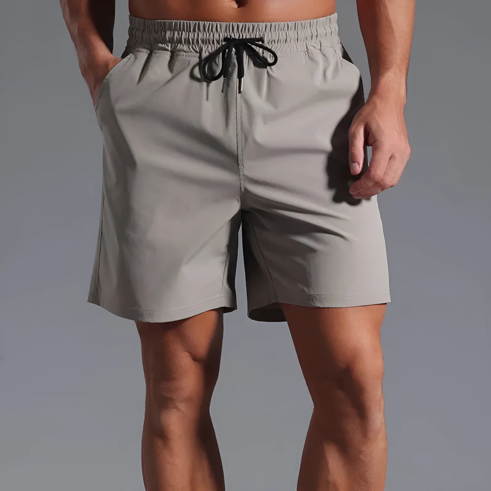 Men's loose fit quick-dry polyester shorts in straight casual style available in four colours