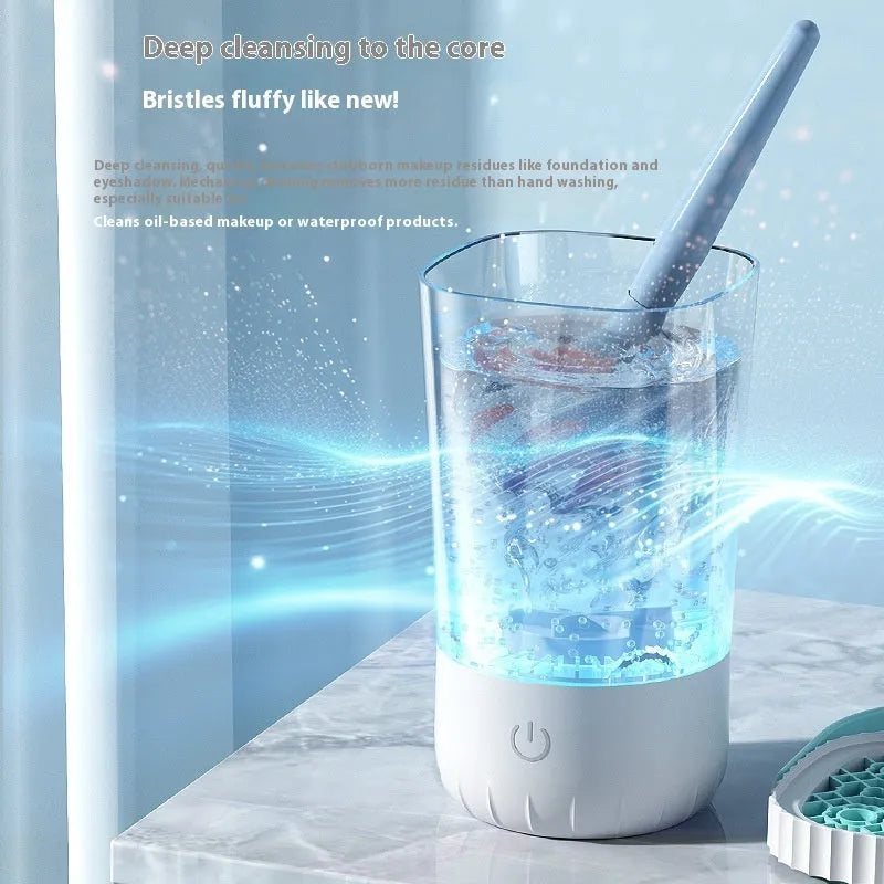 White plastic rechargeable electric makeup brush cleaner with USB charging cable