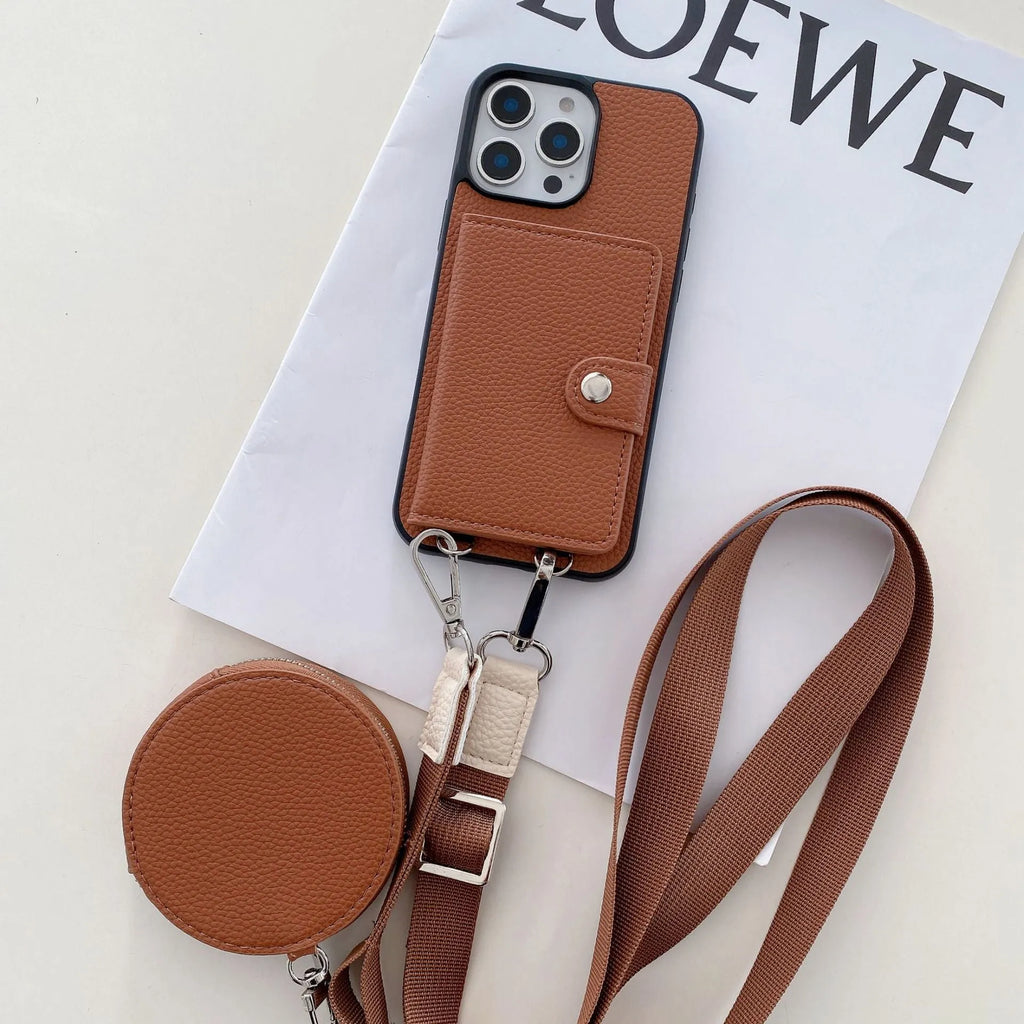 Black PC leather card holder phone case for iPhone with wrist lanyard attached.