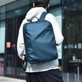 Large black waterproof PU leather backpack for men with simple design and sewing thread details.