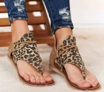 Women's flat cushioned sandals with synthetic upper and rubber outsole in multiple colour options