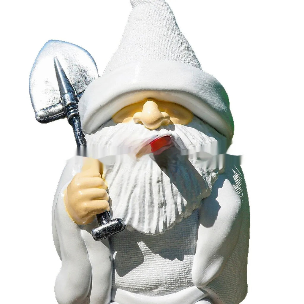 Christmas resin ornament of a dwarf holding a smoking shovel for garden and table decoration