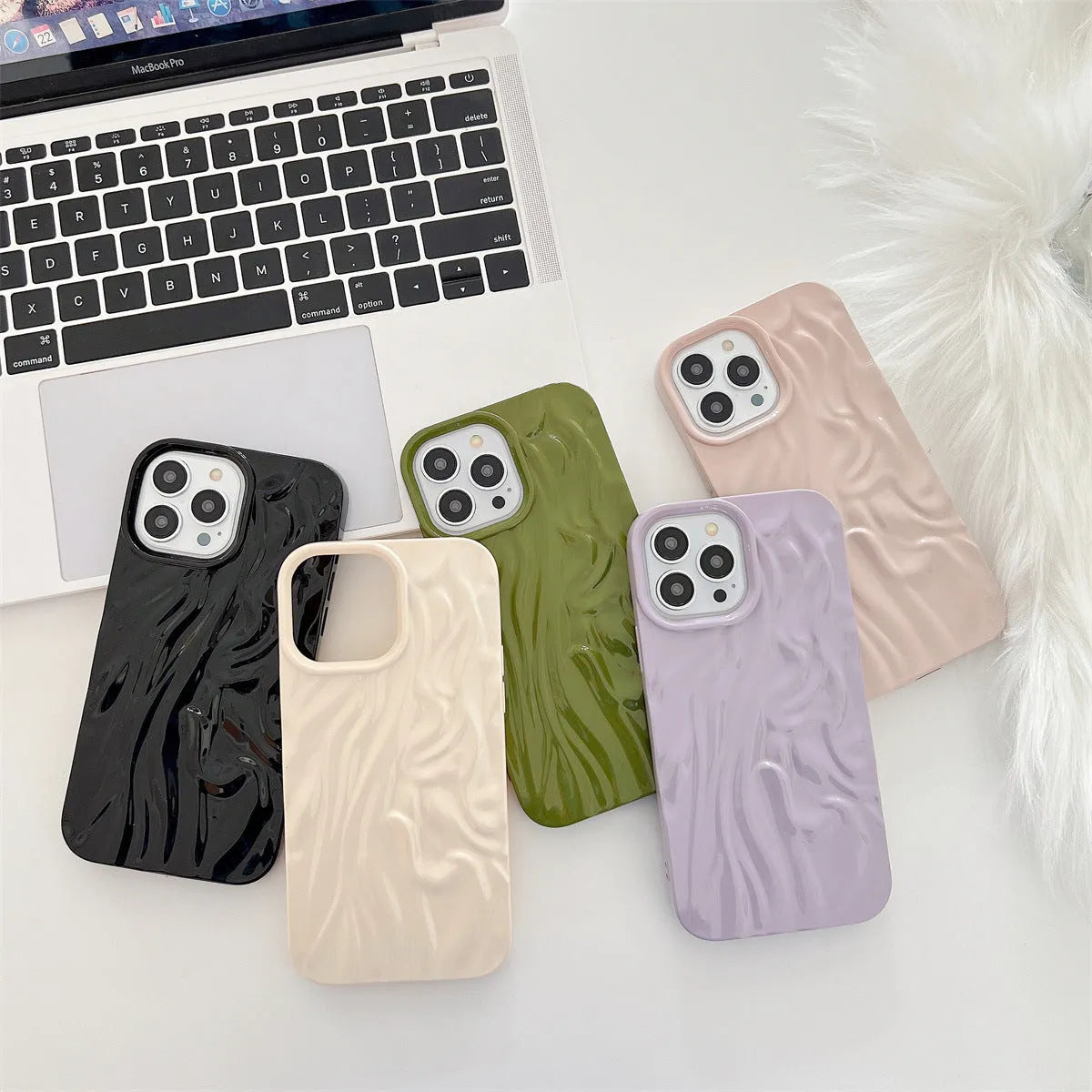 Solid colour water ripple silicone case for iPhone on a white background.