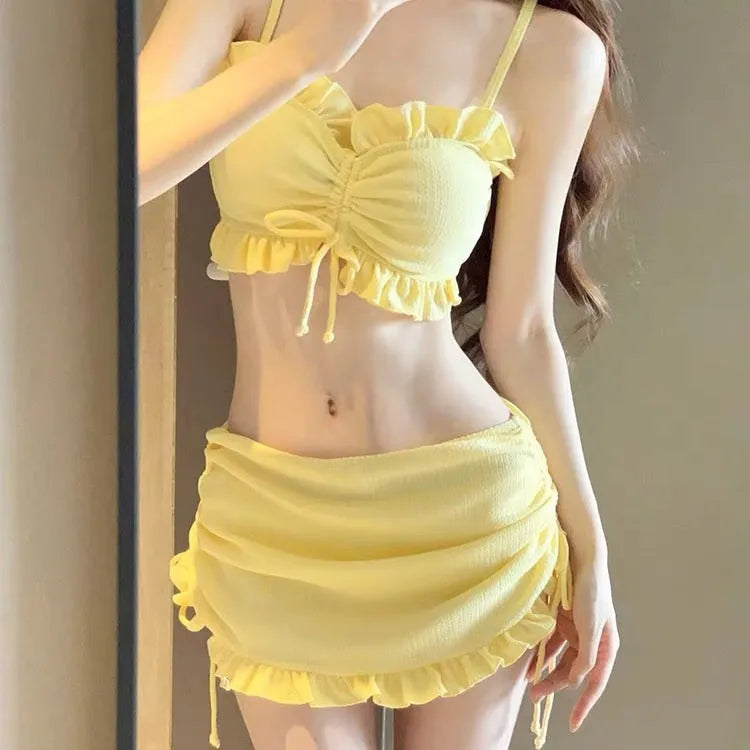 Women's milk silk split bikini swimsuit in black, pitaya red, or yellow solid colour.