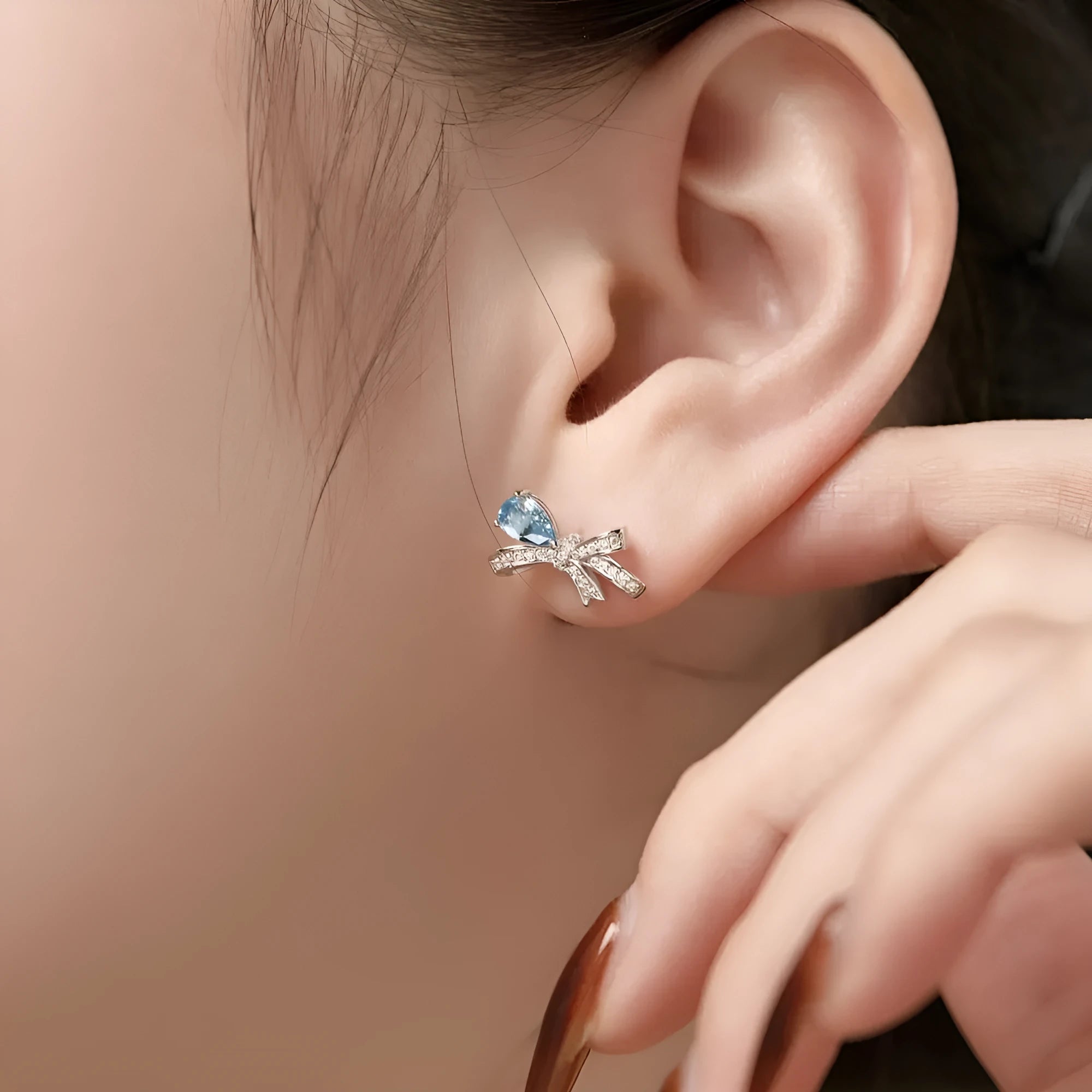 S925 sterling silver butterfly earrings with pear-shaped zircon in blue, pink, and platinum colours