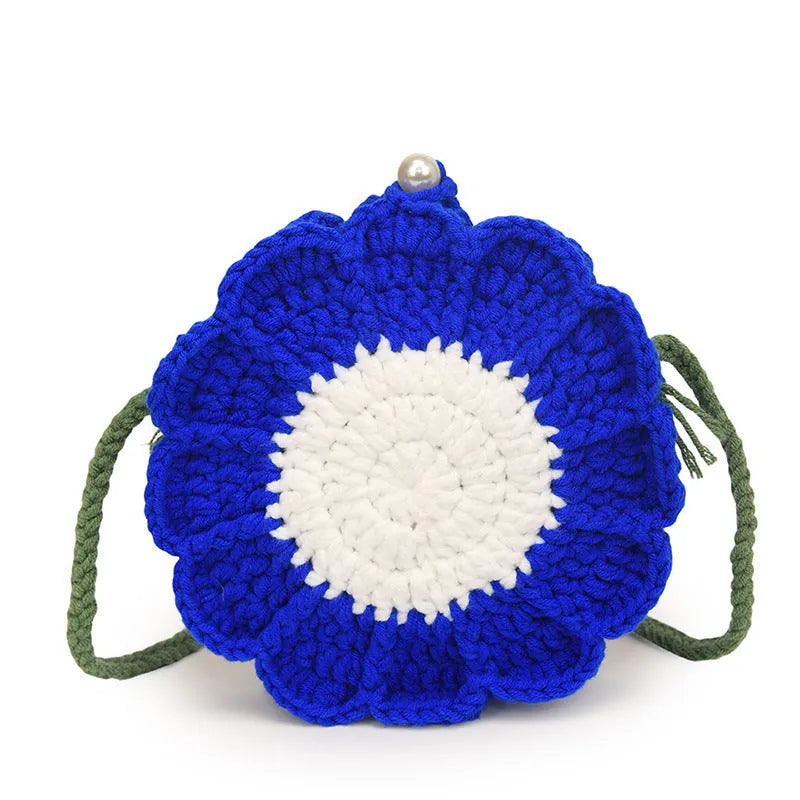 Round hand-woven wool crochet bag with floral detailing and cotton lining in colour options