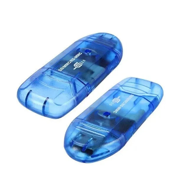 Transparent USB card reader with LED light option on desk next to memory cards