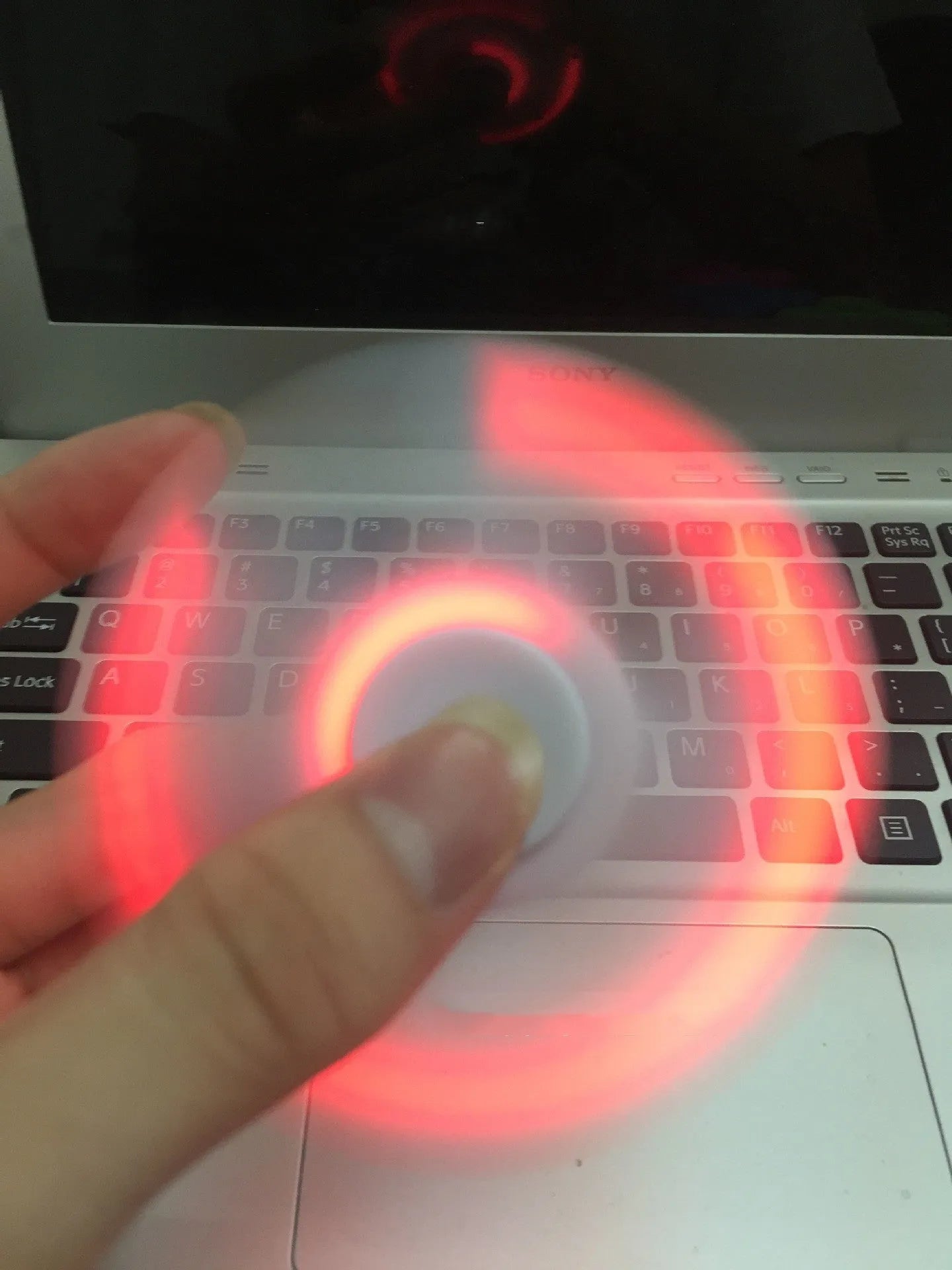 Blue Bluetooth speaker music fidget spinner MP3 player with TF card slot measuring 80mm diameter