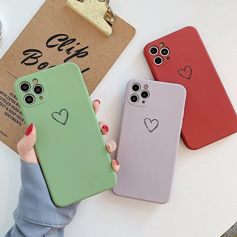 Silicone TPU phone case for Apple iPhone in solid colour options including black, green, pink, purple, red, and white.