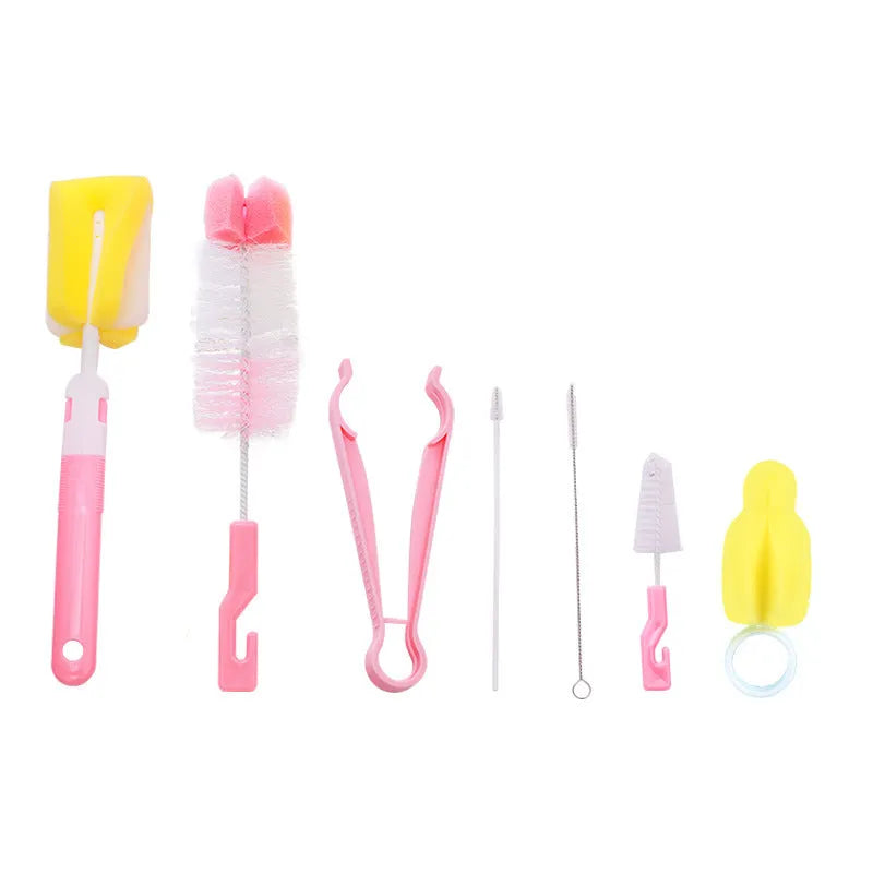 Orange Belle seven-piece bottle brush set in blue and pink includes sponge brush, nylon brush, nipple brushes, straw brushes, and bottle holder