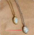 Simple geometric oval jelly opal pendant necklace on S925 silver chain in gold or white gold finish.