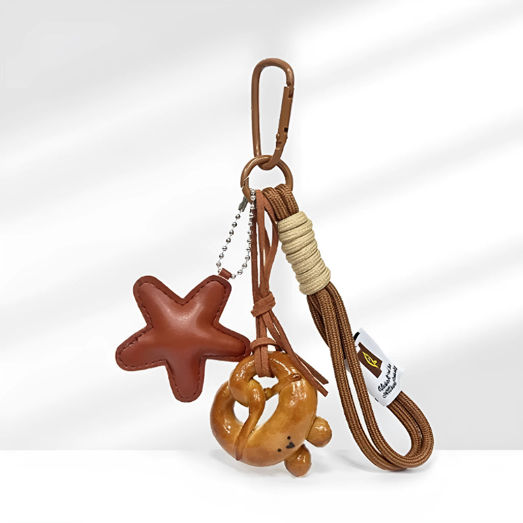 Handmade soda bread style handbag pendant with brown star and baked varnish finish