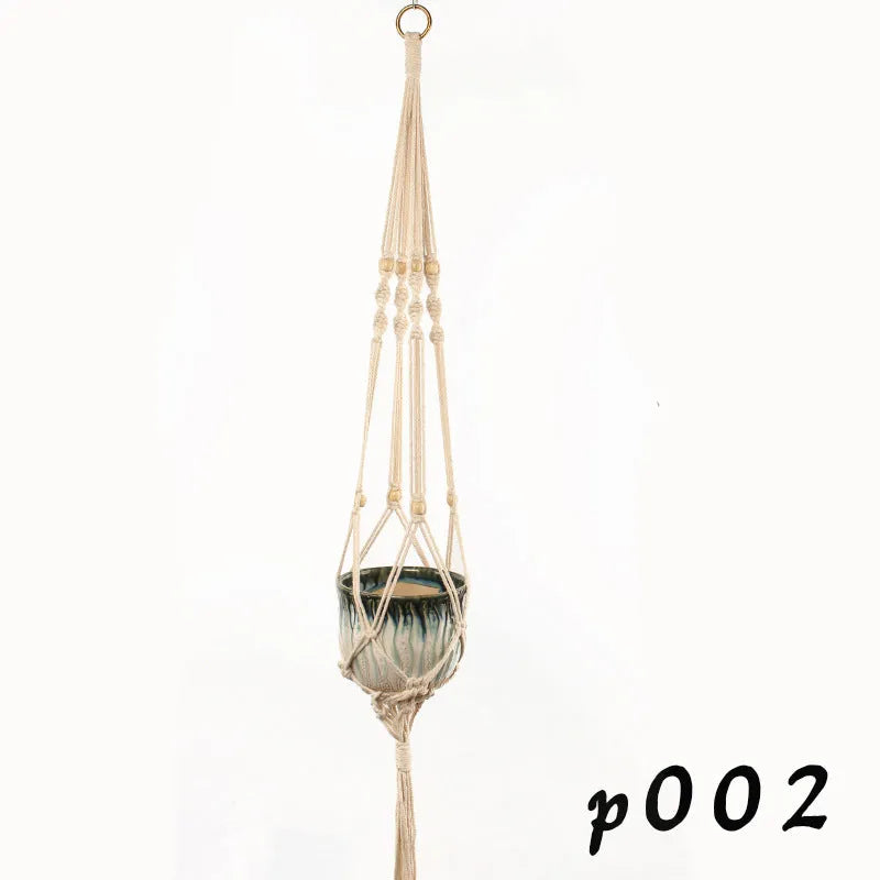 Woven wire planter basket made from cotton rope, shown in a desktop style holding a small plant.