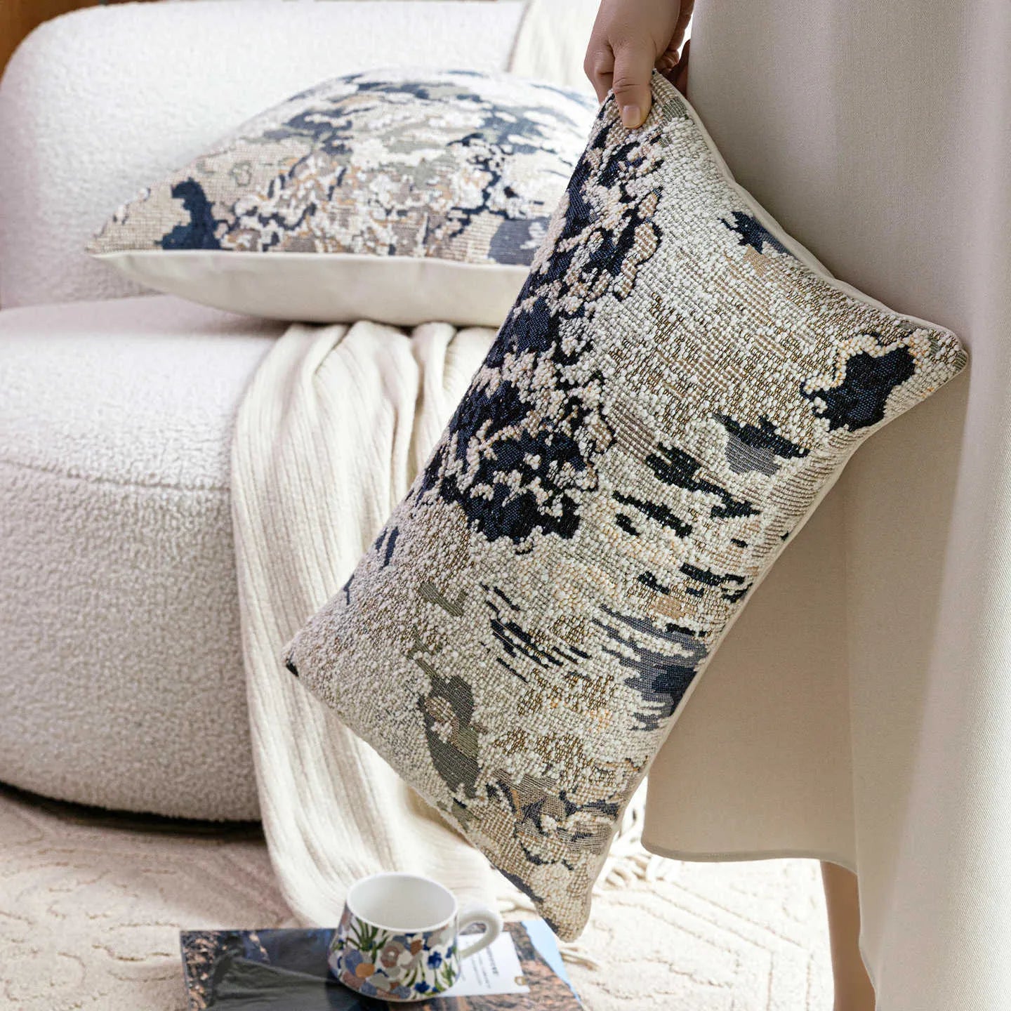 Antique blue wool blend pillow with abstract floral print, shown in square and waist pillow sizes.