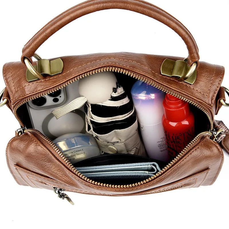 Soft PU leather women's crossbody bag in a horizontal square shape with a sandwich pocket.
