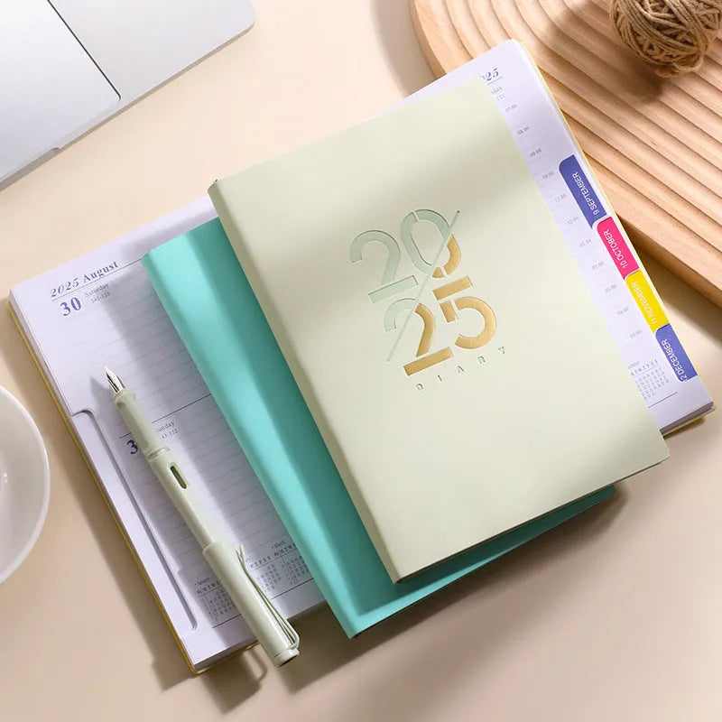 A5 daily schedule book with soft faux leather cover in various colours including pink, yellow, purple, blue and green