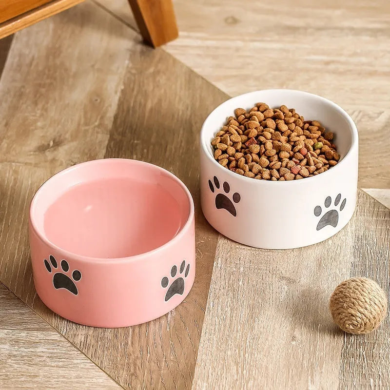 Ceramic cat paw design pet bowl with high-foot base in slanted mouth style