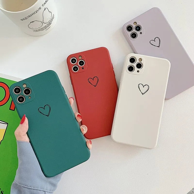 Silicone TPU phone case for Apple iPhone in solid colour options including black, green, pink, purple, red, and white.