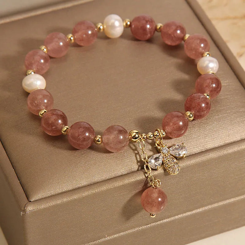 Women's strawberry quartz and freshwater pearl bracelet with zircon details in alloy setting