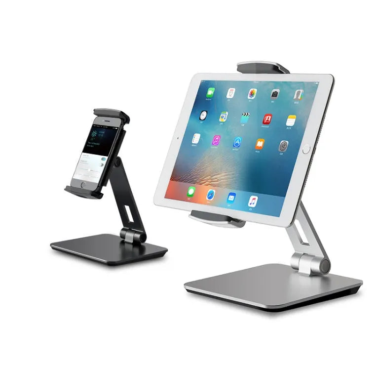 Folding aluminium phone and tablet stand in silver, shown holding a tablet at an angle.