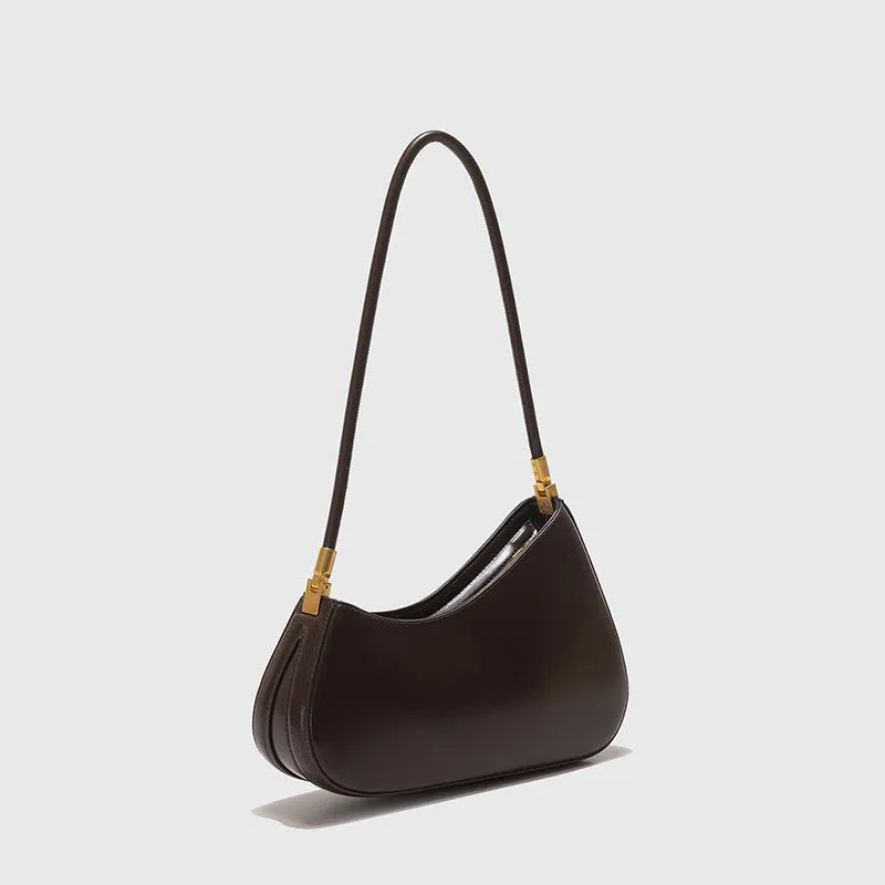 Oval-shaped brown PU leather women's underarm handbag with a single shoulder strap and visible stitching.