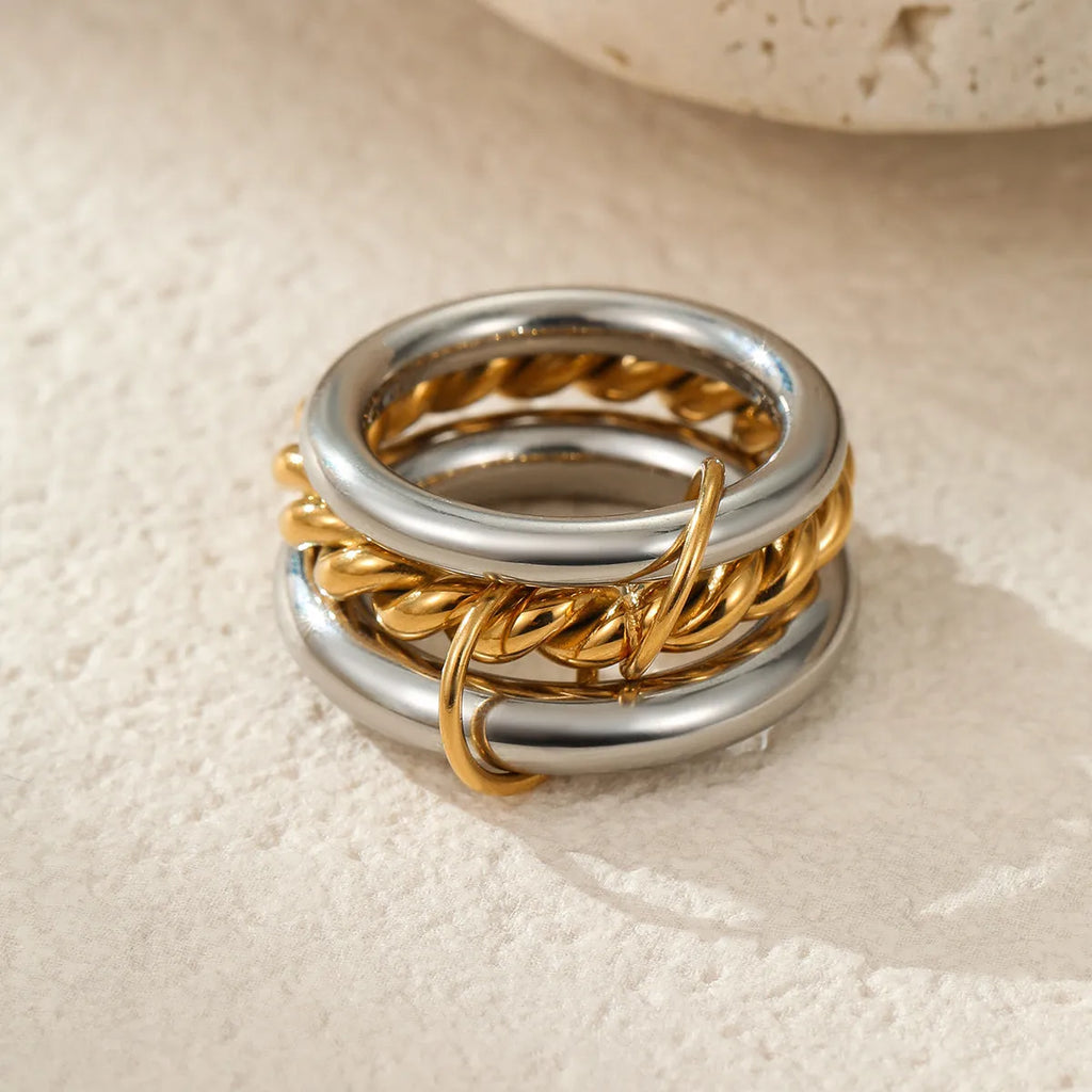 Stacked colour matching stainless steel ring with 18K gold plating and exaggerated personalised design