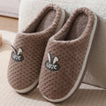 Women's plaid design artificial fur house slippers with a thick rubber non-slip sole in apricot colour