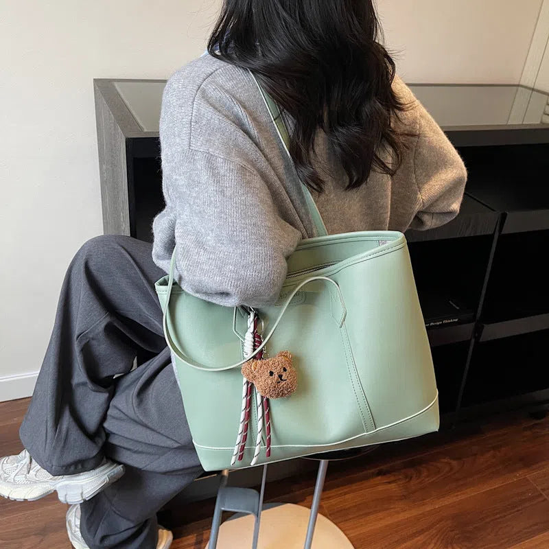 Niche Fashion retro shoulder tote bag in horizontal rectangular shape with stitched seams, PU material, available in multiple colours