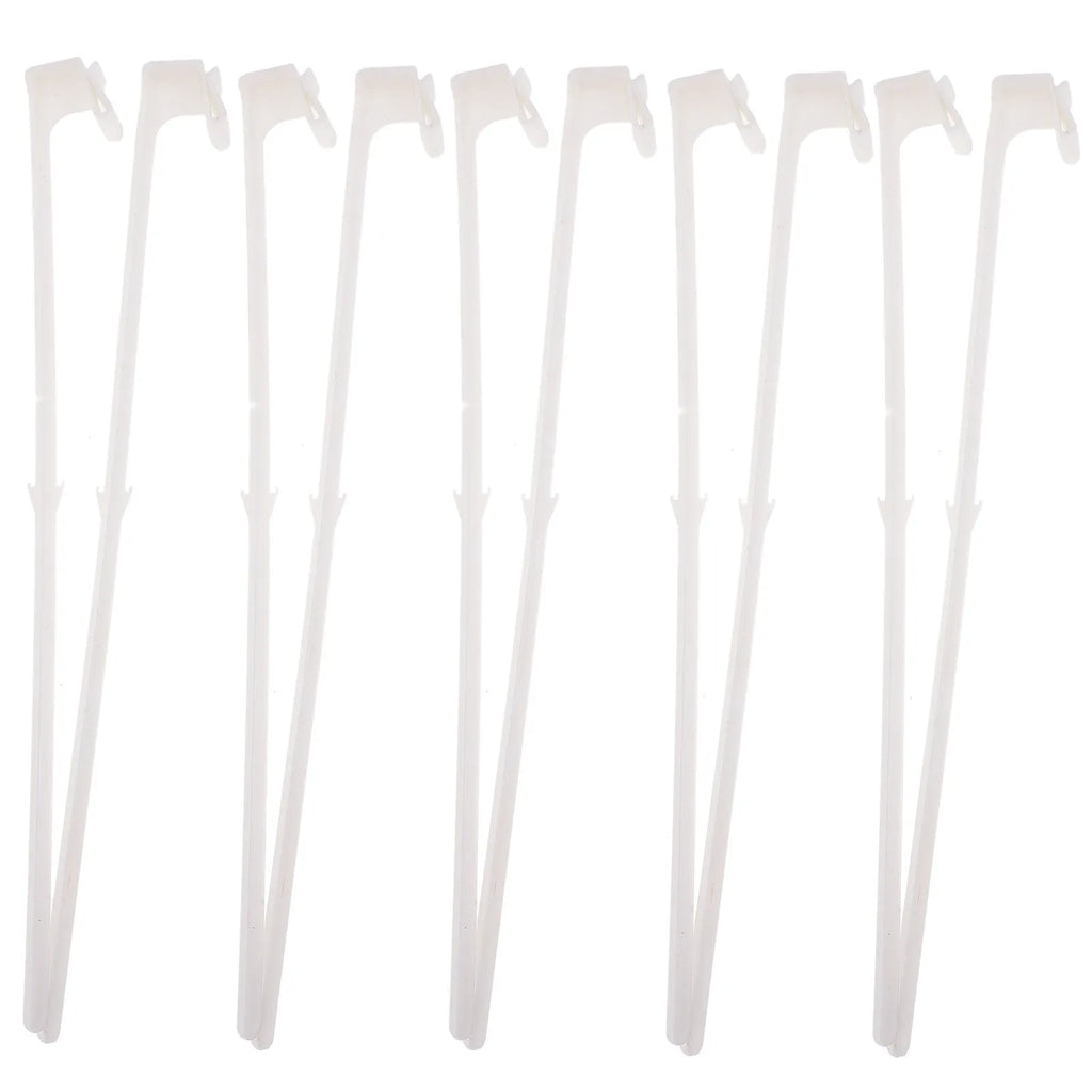 Ten white PP plastic car window flagpole holder clips laid out.
