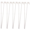 Ten white PP plastic car window flagpole holder clips laid out.