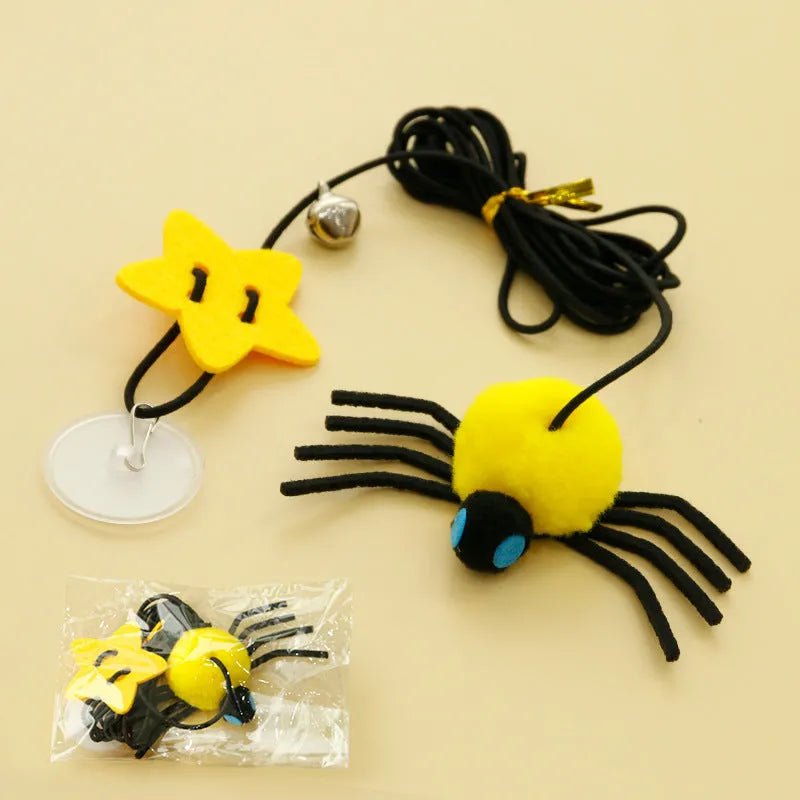 Red or yellow elastic rope cat toy with feather stick and fabric spider bell hanging from a door