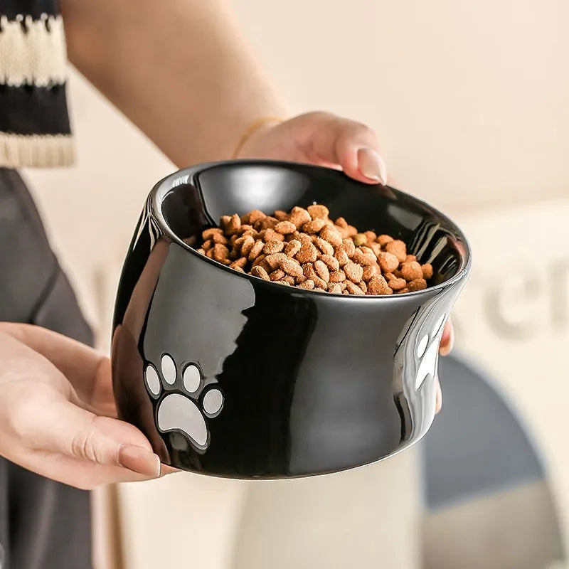 Ceramic cat paw design pet bowl with high-foot base in slanted mouth style