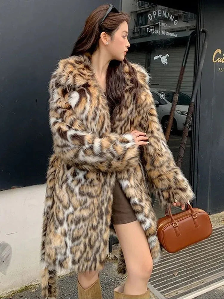 Long faux fur coat with fur collar and pockets in street fashion style