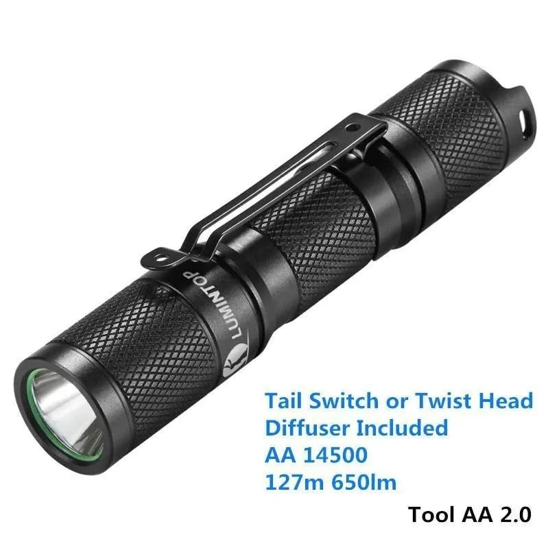 Black Lumintop Tool AA 2.0 aluminium keychain flashlight with magnetic tail cap and diffuser accessory.