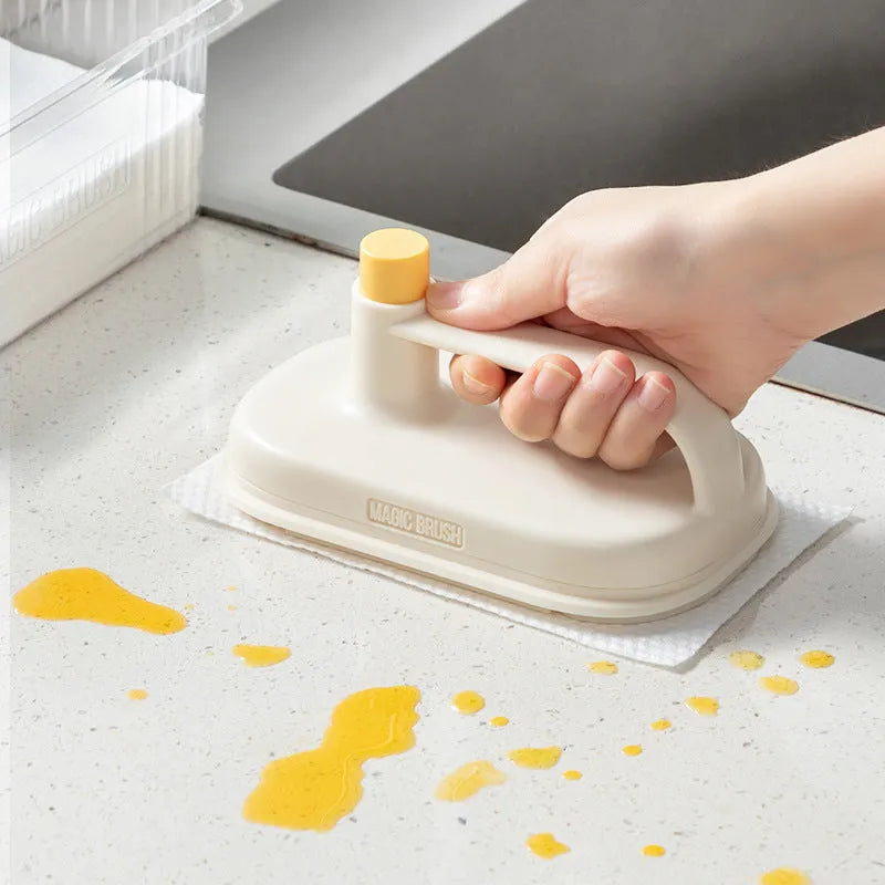 Magic Brush disposable cleaning brush with handle, 50 white rag refills, and a storage box holder.