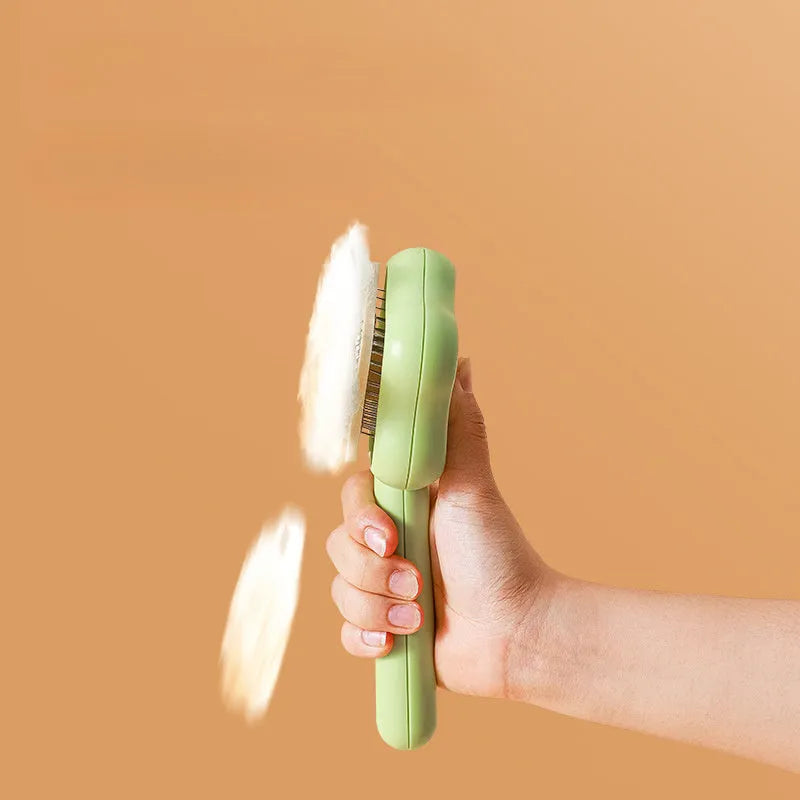 Green or yellow self-cleaning stainless steel cat comb measuring 20cm long