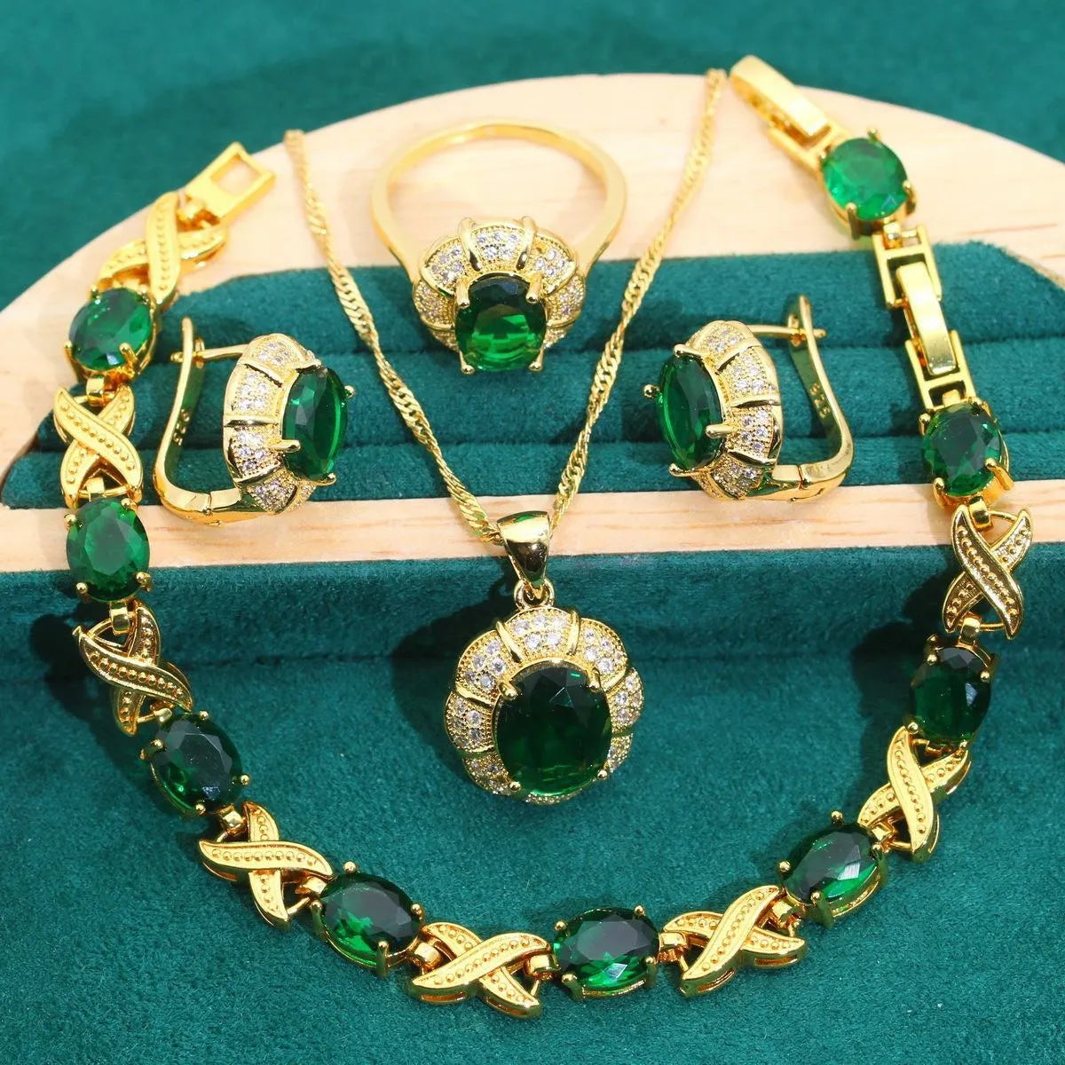 Gold plated jewellery set with multi-colour zircon stones, showing necklace, earrings, bracelet, and ring.