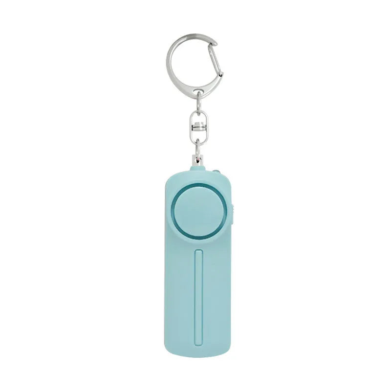 Compact pink girls self-defense alarm showing dimensions with loud 130 dB siren and LED light.