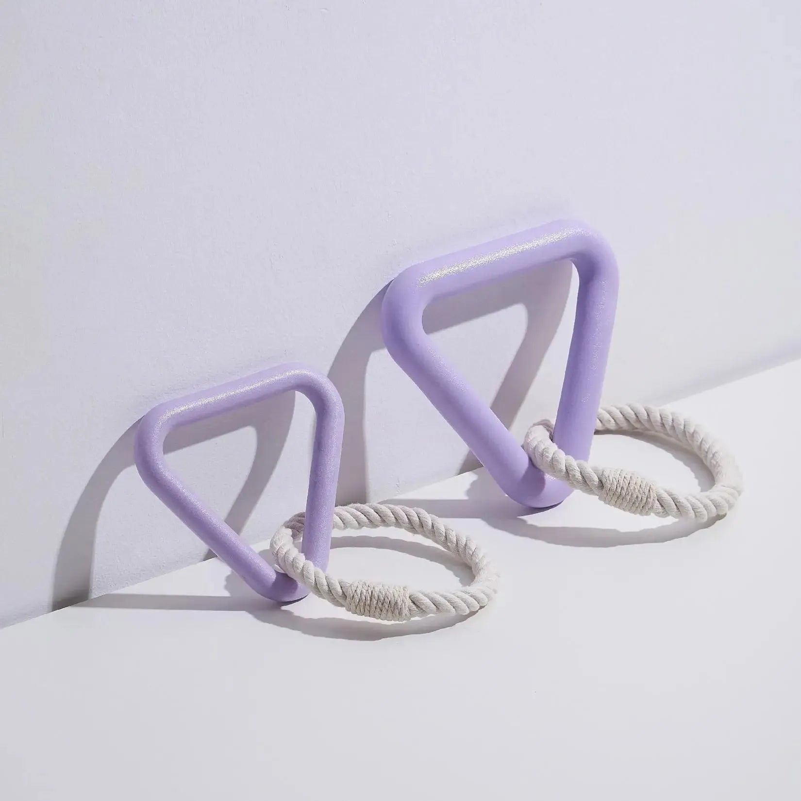 Large triangular cotton rope pull ring dog toy in beige, pink, and purple colour options