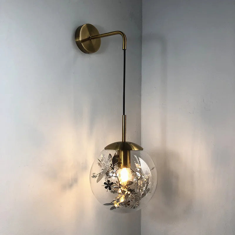 Modern glass wall lamp in golden flower finish with LED bedside lighting