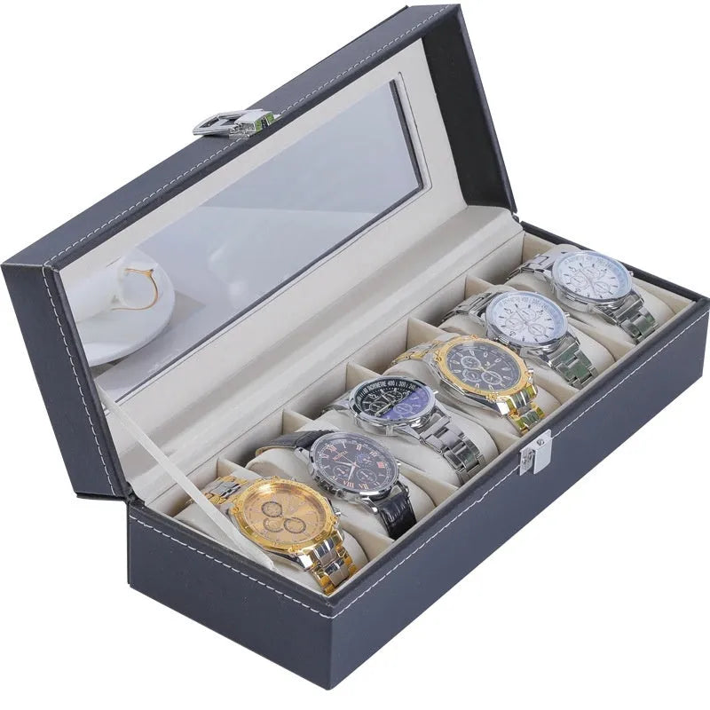 Grey leather watch storage box with transparent dustproof lid showing multiple watch slots inside