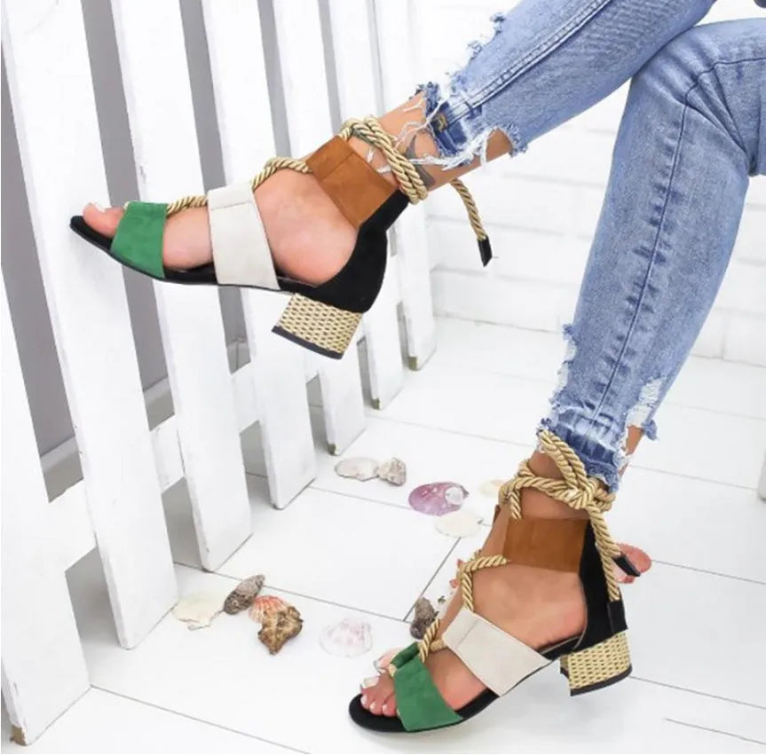 Women's beige suede sandals with a round head, thick middle heel, fish mouth toe, and front ankle straps.
