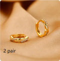 Geometric hemp rope interwoven earclip earrings in gold colour with diamond treatment surface