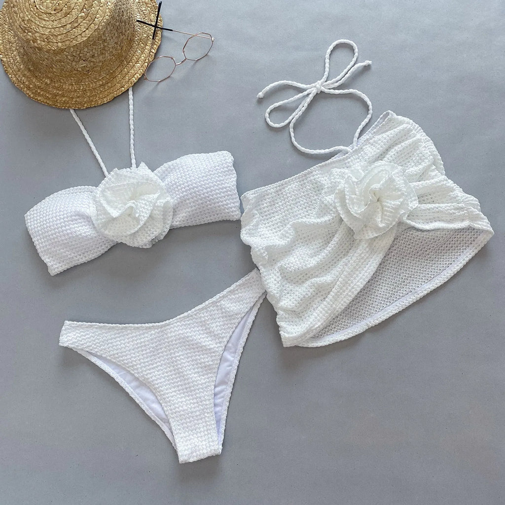 Women's 3D flower split bikini set in white or purple, includes skirt, bra, and briefs.