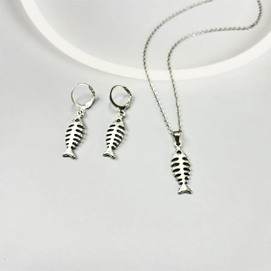 Women's fishbone pendant necklace and matching earrings set with adjustable O-chain