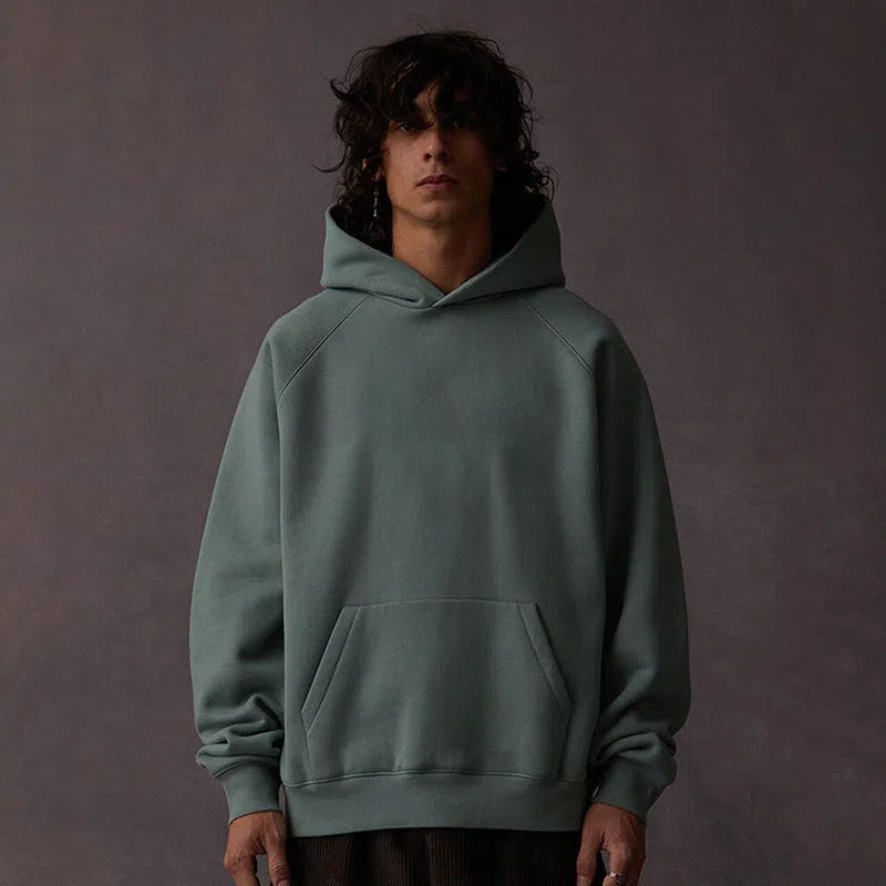 Blank heavyweight cotton raglan hoodie in Charcoal Gray with 3D patch pocket, loose fit pullover style