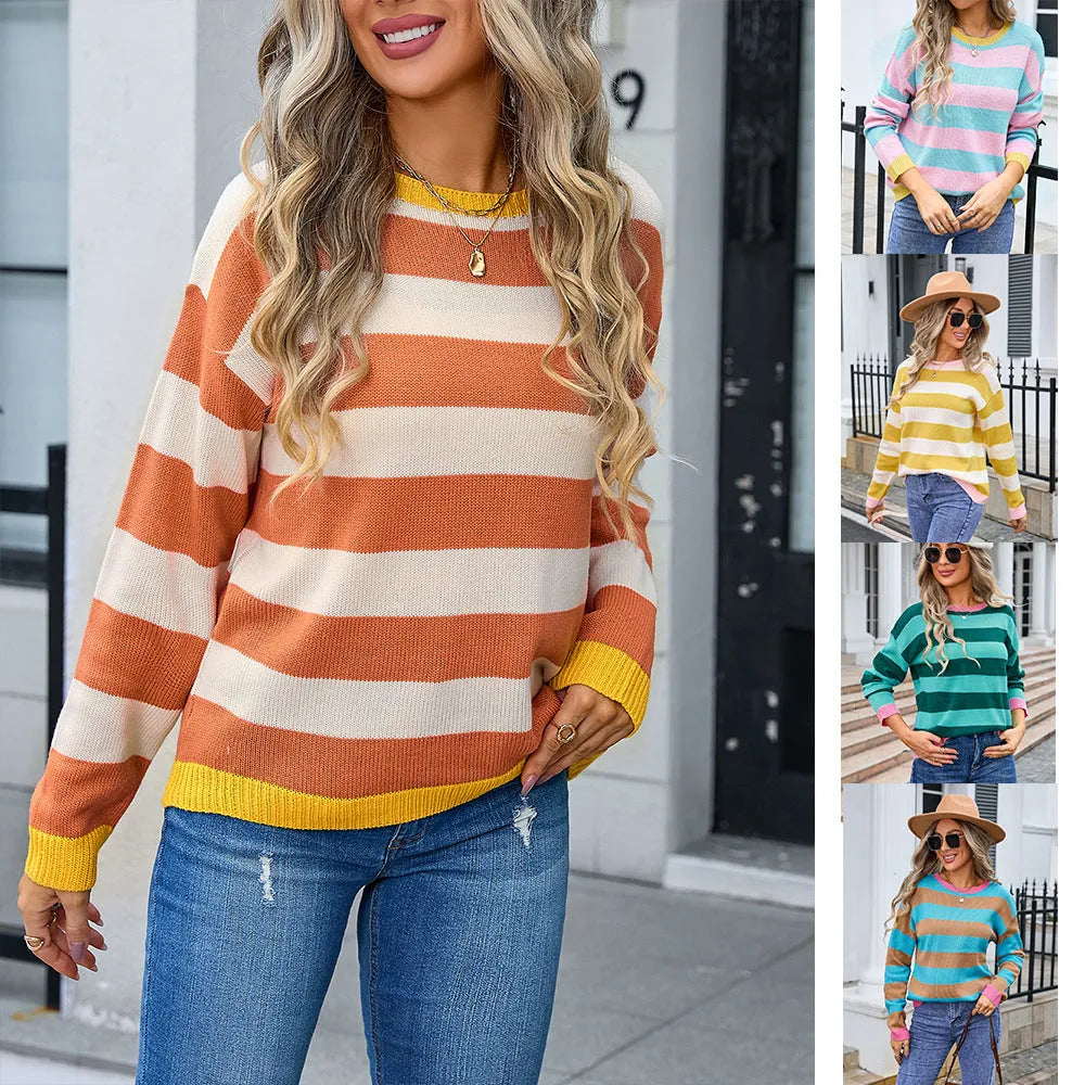 Women's loose blue acrylic sweater with striped pattern and round neck.